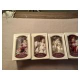 Four Porcelain Doll Collectible Ornaments