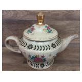 Vintage porcelain tea pot 9x7"