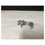 Grey Elephant Figurine Set on a White Background -