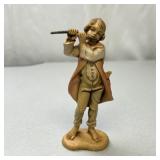 Vintage Flute-Playing Boy Figurine