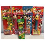 5- NIP PEZ DISPENSERS. 3- DISNEY AND 2- TEENAGE