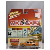 NIP JOHNNY LIGHTNING MONOPOLY DIECAST.  97 FORD