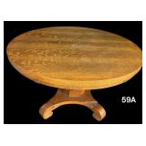 ANTIQUE OAK ROUND PEDESTAL TABLE WITH NICE QUARTER SAWN TOP AND TWO LEAVES