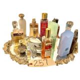 VINTAGE MIRRORED DRESSER TRAY W/ ASSORTMENT OF PERFUME TO INCLUDE ELLEN TRACY, VICTORIA’S SECRET, GINGER ESSENCE ORIGINS, MUGLER, LUCKY BRAND, ELIZABETH ARDEN, ETC.