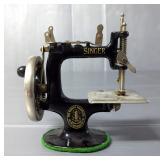 The Singer Manufacturing Company "Singer Sew Handy" Childs Hand Crank Sewing Machine, 7" x 7" x 3.5"