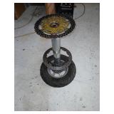 Handmaid motorcycle parts bar stool.