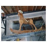 Large wooden rocking horse 54 inches long.