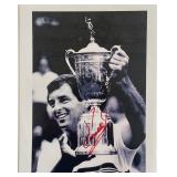 Professional golfer Fuzzy Zoeller signed photo