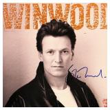 Steve Winwood signed "Roll With It" album