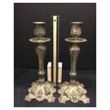 Ornate silver tone candle holders