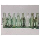 8 vintage coca cola glass bottles