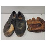 Vintage baseball glove and pair of shoes