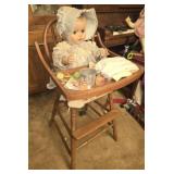 Vintage baby doll and high chair