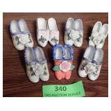 Pairs of porcelain miniature shoes