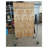 Adjustable height rolling garment rack