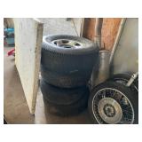 4 various size tires and rims