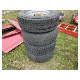 (4) P235/75 R15 tires w/rims