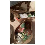 Two brown bags with decorative items, including