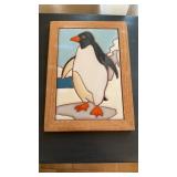 Ceramic penguin tile, in a wood frame, 10 x 7ï¿½