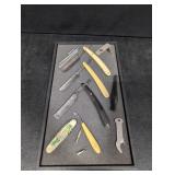 Assorted straight razors, jackknife, thermometer