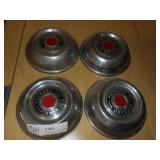 set of old Packard hubcaps