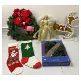 Assorted Christmas decor including wreath,