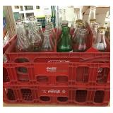 Coca-Cola plastic crates & pop bottles