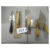 Assorted concrete trowels (1 is magnesium), and dr