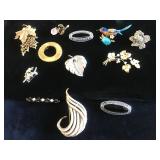 Multiple costume jewelry brooches/pins