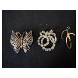 Three Brooches