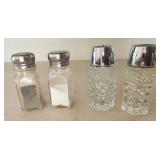 Glass salt and pepper shakers, pressed glass