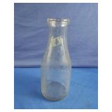 Vintage glass milk jug. One quart