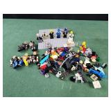 Legos figures, wrestling. Assorted pieces