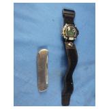 Mens watch and a foldable pocket knife