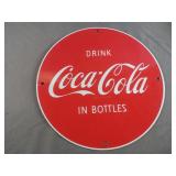 Vintage Coca-Cola porcelain covered metal round