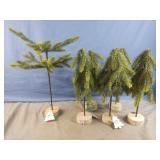 6 table top plastic green trees. 13" tall