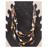 Multicolred beaded string necklace 10"