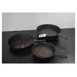 Three Cast Iron Skillets