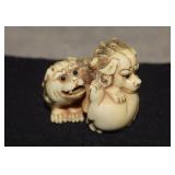 Carved Foo Dogs Bone Netsuke