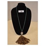 Beaded Cheetah Print Tassel Necklace. Stand