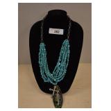 Faux Turquoise Necklace. Stand Included