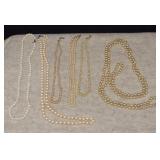 Six Pearl Necklaces