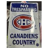 New Canadians No tresspassing Tin Sign