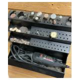 Dremel and bits in case rack