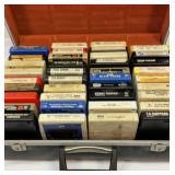 Eight track tapes in case