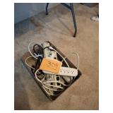 Assorted extension cords and power strips