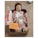 Antique cloth doll with clothes