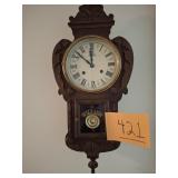 Antique wall clock with key, 26" tall