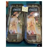 Two Coca-Cola advertising trays printed in the