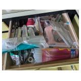 Drawer with Assorted Tubes, Glue Sticks, and